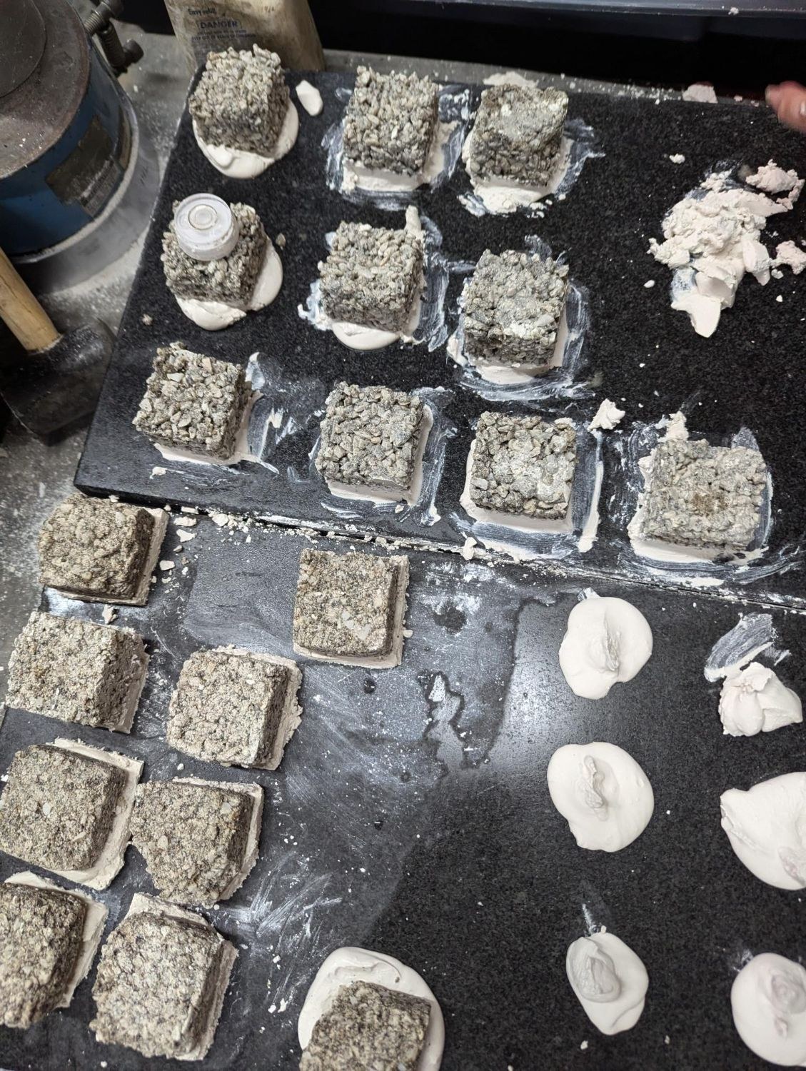 Cement cubes capped and ready for compressive strength testing