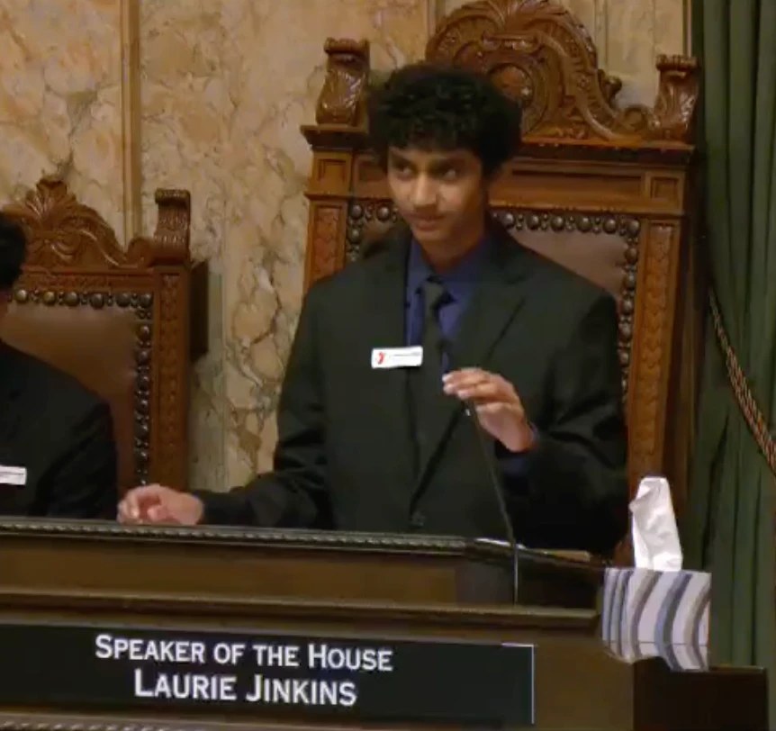 Smaran presiding at the rostrum in the Washington State House chamber during Youth and Government